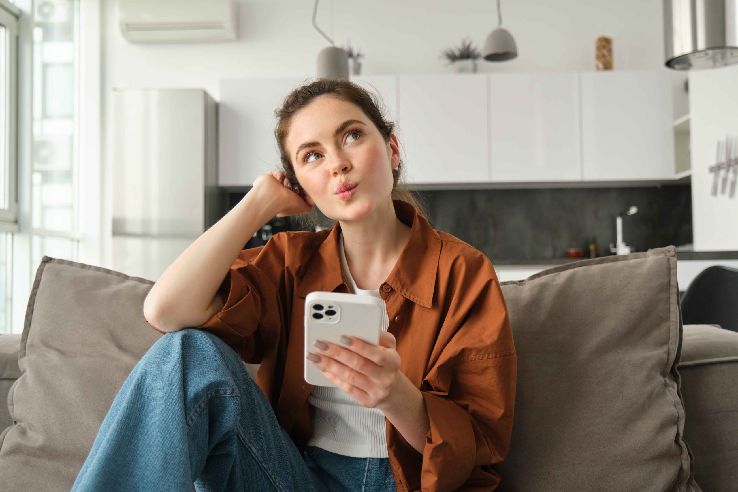 person resetting Wi-Fi settings on phone